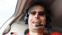 Michael Reimann im Helikopter.